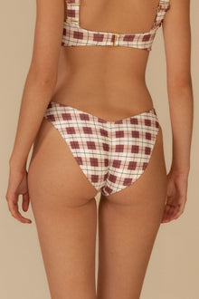 Maroon and cream plaid bikini bottom with zig-zag stitching and higher leg coverage.
