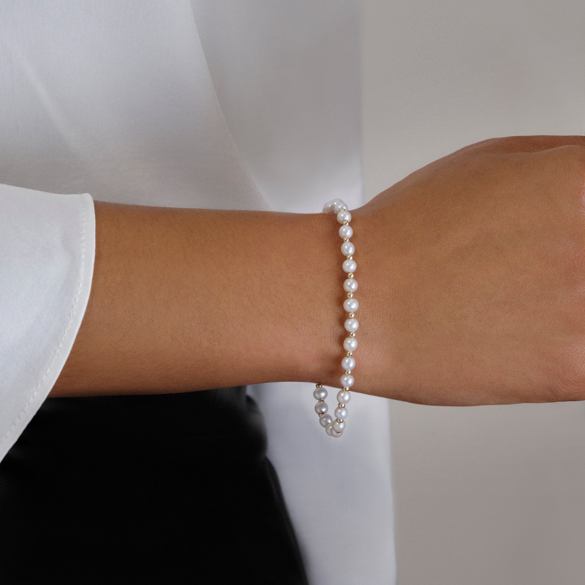Image of 14K Yellow Gold Polished in Pearls Bracelet on Models Arm
