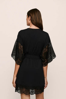 Model is wearing Beatrix TENCEL Modal Robe in Black