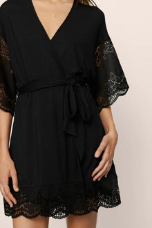 Model is wearing Beatrix TENCEL Modal Robe in Black