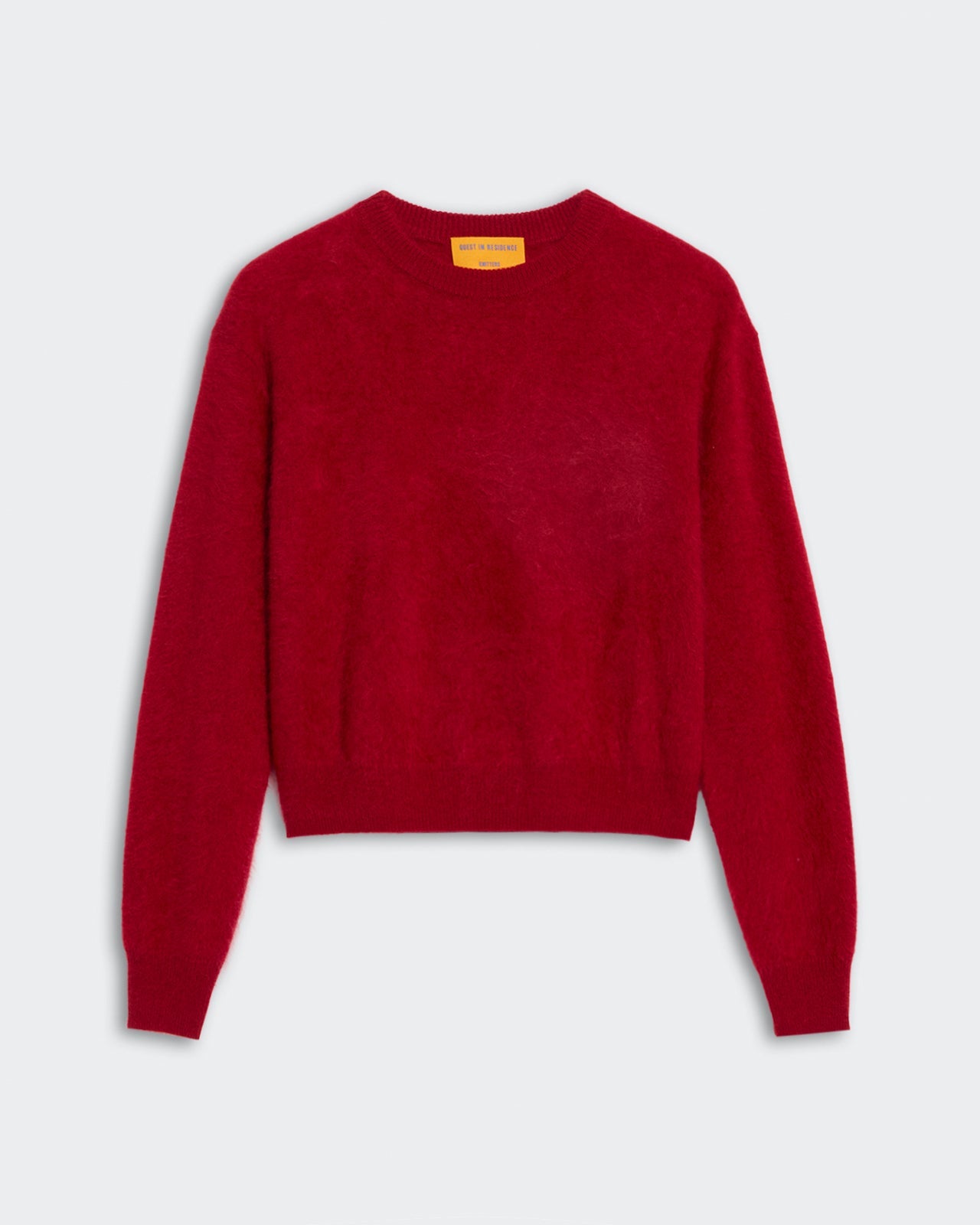 Grizzly Crew - Ruby red crew neck sweater with long sleeves and ribbed cuffs in cozy soft fabric.